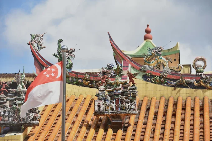 Ornate roof figurines at Leong San See Temple